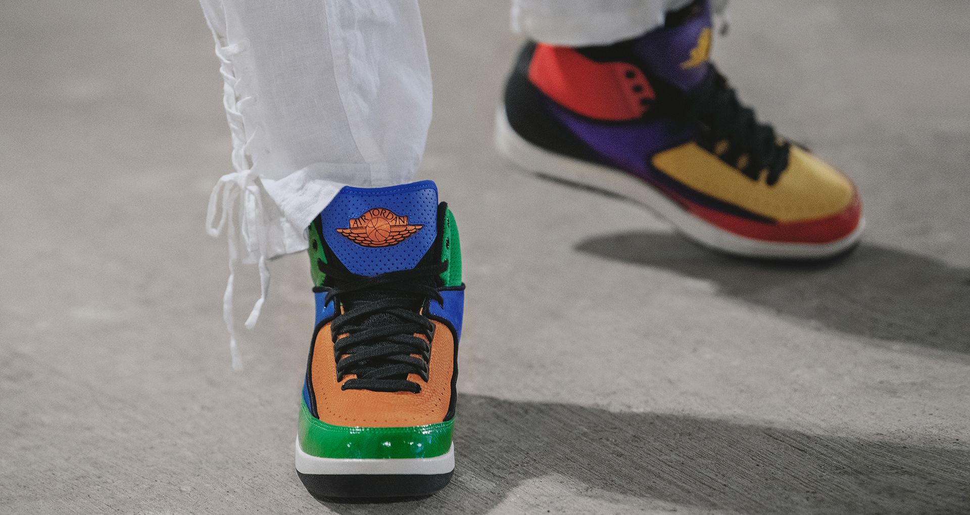 2 different color jordans